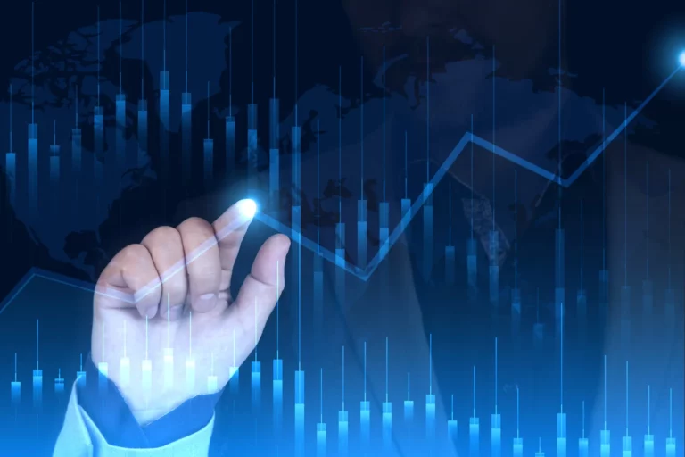 an image of hands with graph. representing the movement of market. a sort manipulation