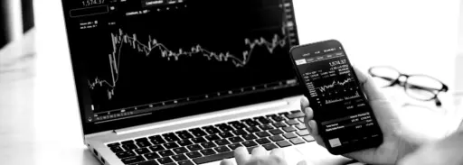stock image on smartphone and laptop